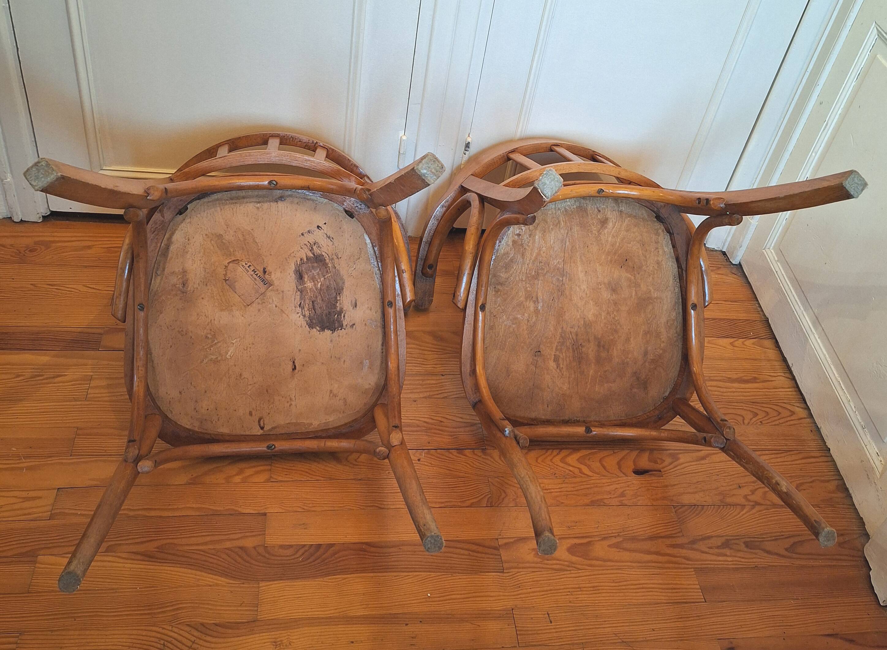 Curved wooden armchair