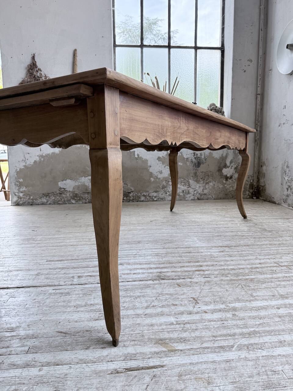 Farm table cherry wood with curved legs, 19th century.