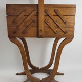 Worker on wooden feet