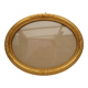 Large old oval gilded wooden frame and stucco decorations