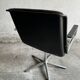 Wilkhahn Delta lounge chair in black leather with polished aluminum base and footrest (1970s)