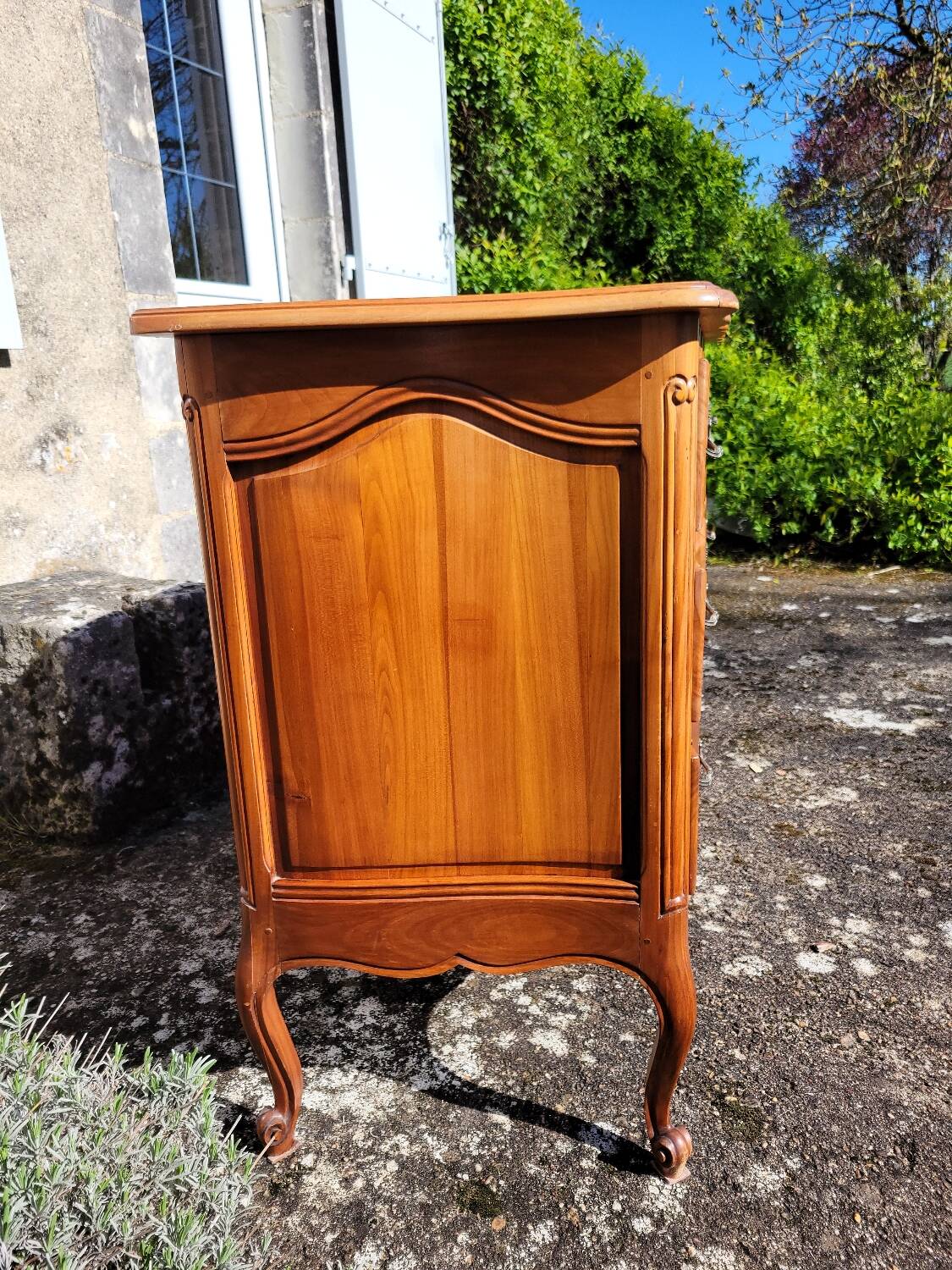 Louis XV style crossbow commode in cherry wood