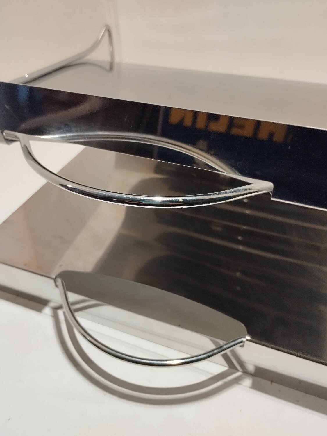 Vintage stainless steel magazine rack