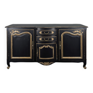 Grand buffet de style Louis XV en chêne laqué noir et rechampi or