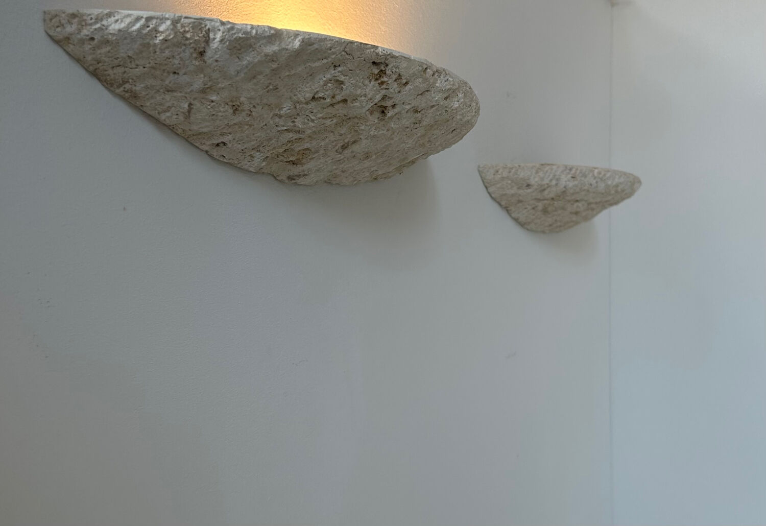 Pair of vintage stone sconces, natural beige, Italy 1979