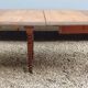 Table ovale 6 pieds avec allonges patine caramel