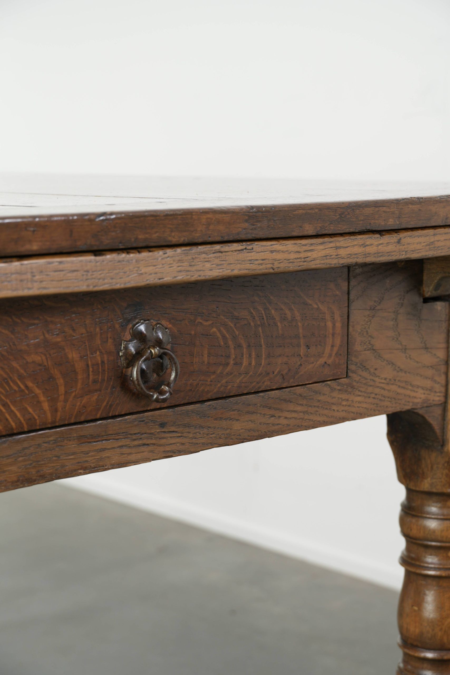 Antique oak dining table from the late 18th century with extendable leaves