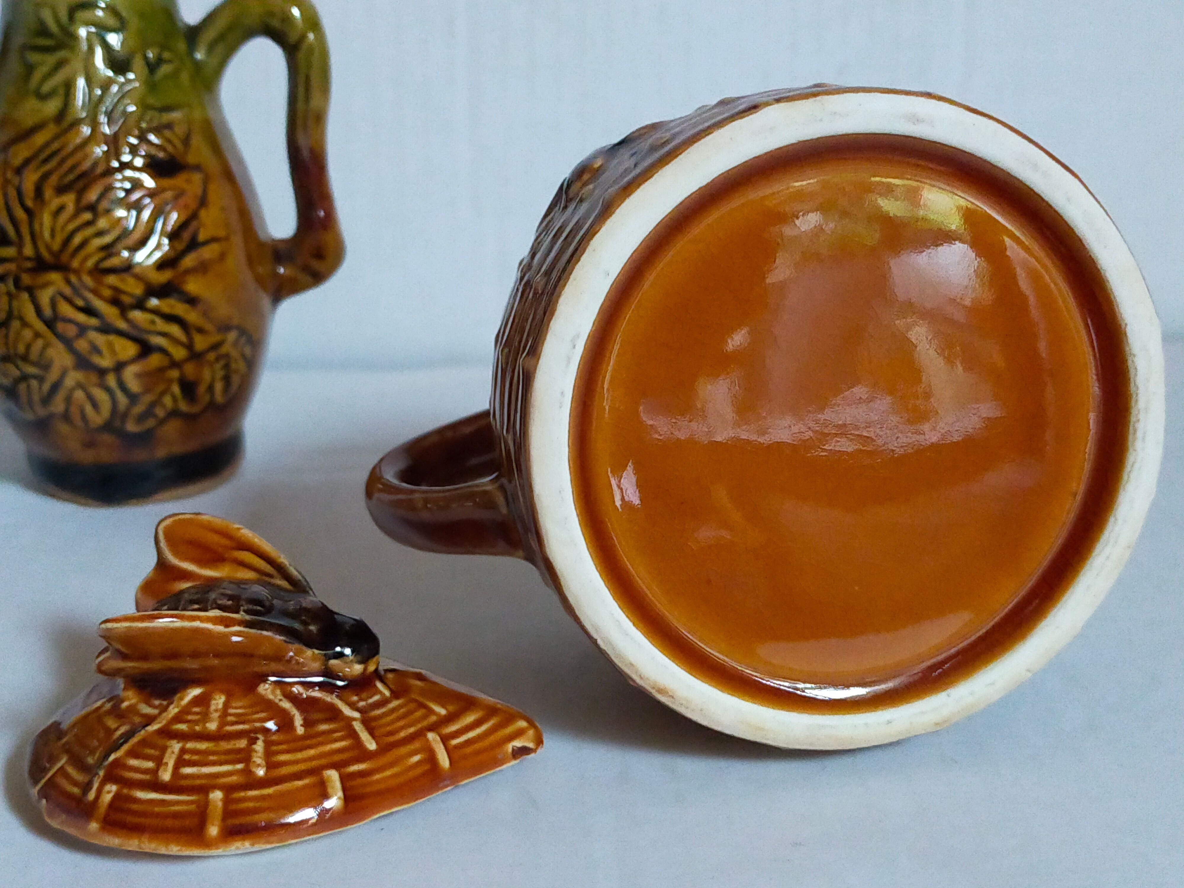 Set of old teapots and honey pot