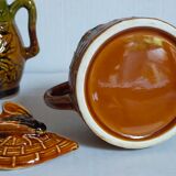 Set of old teapots and honey pot