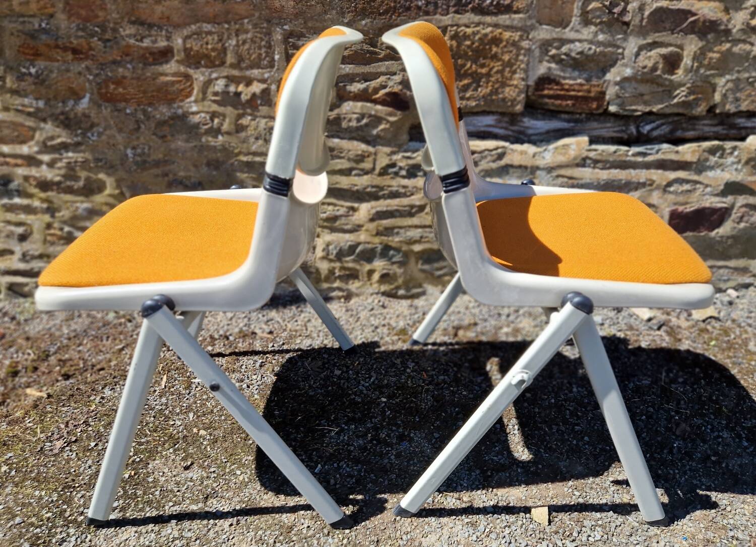 Duo of Dorsal chairs by E Ambasz and G Piretti for OpenArk in 1990
