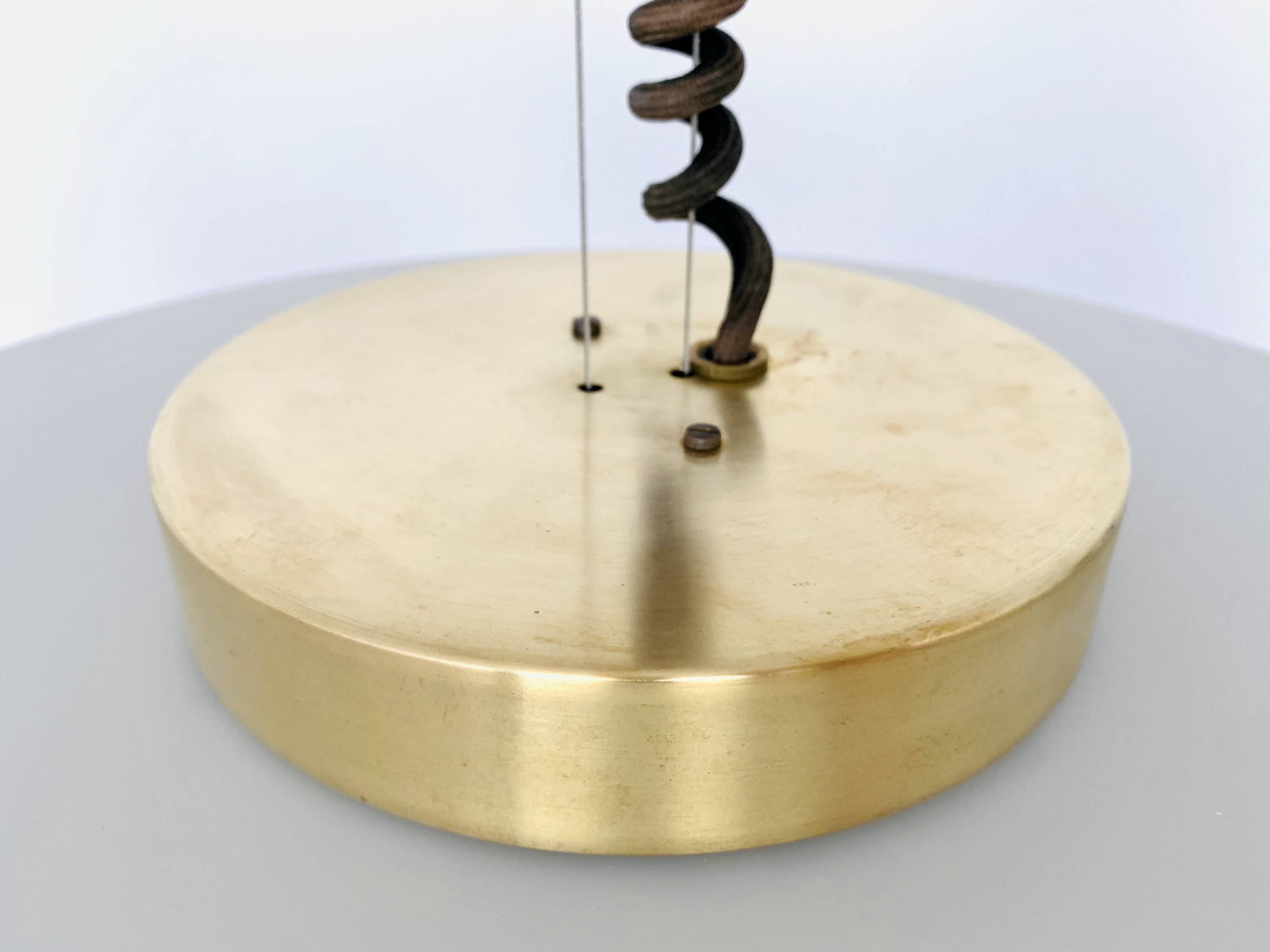 1 of 3 Awesome Adjustable Orion Glass Pendant Lamps from Staff