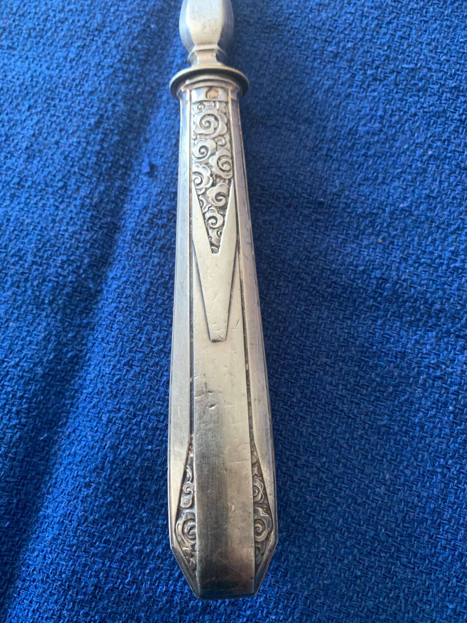 Pelle à tarte métal argenté
