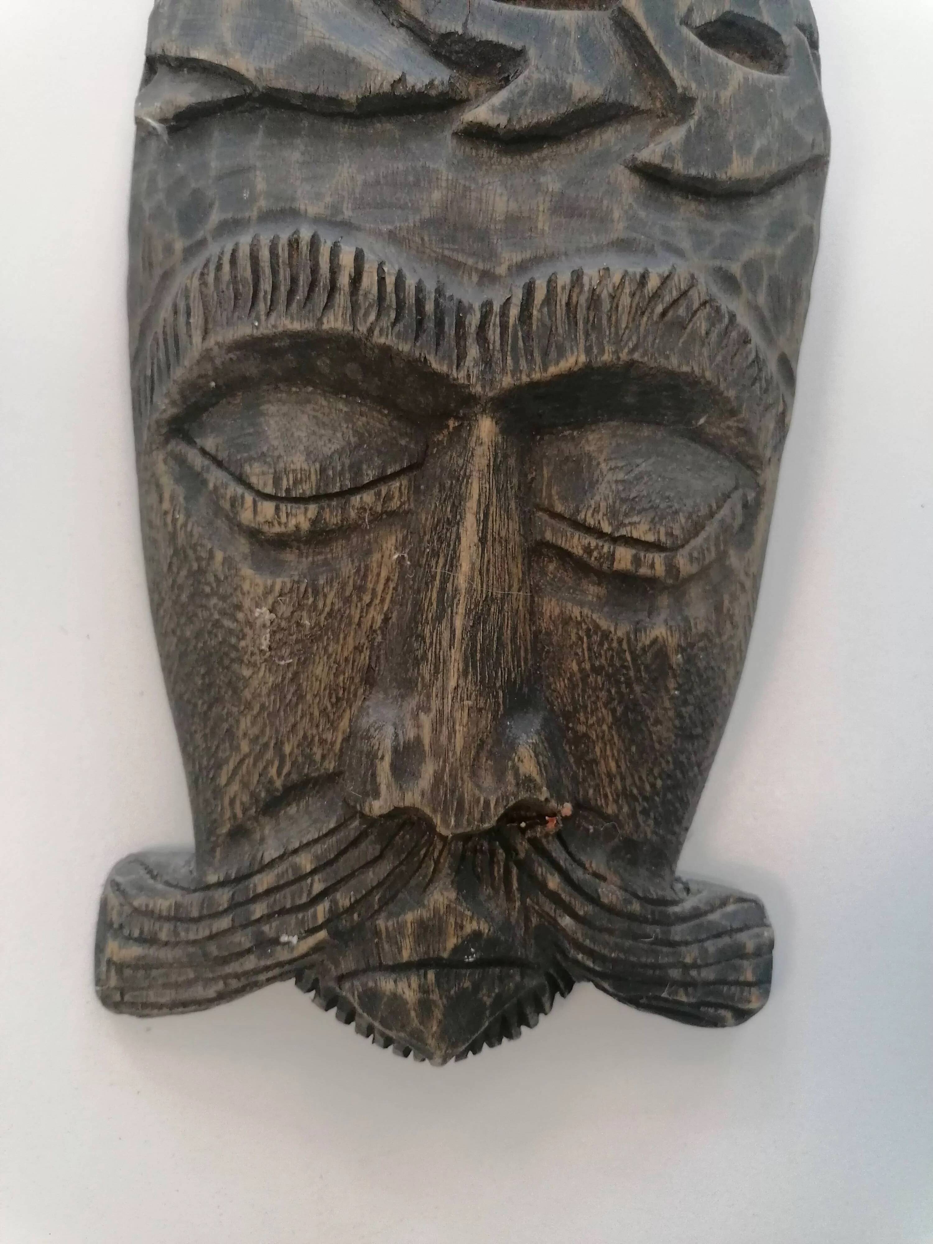African tribal mask in carved wood - decorative ethnic art
