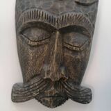 African tribal mask in carved wood - decorative ethnic art