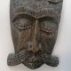 African tribal mask in carved wood - decorative ethnic art