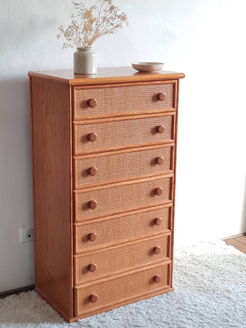 Vintage wicker chest of drawers.