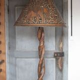 Liane and metal floor lamp with perforated leather shade featuring elephant patterns, lise.