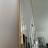 Large vintage Hollywood Regency style mirror with shutters.