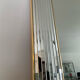 Large vintage Hollywood Regency style mirror with shutters.