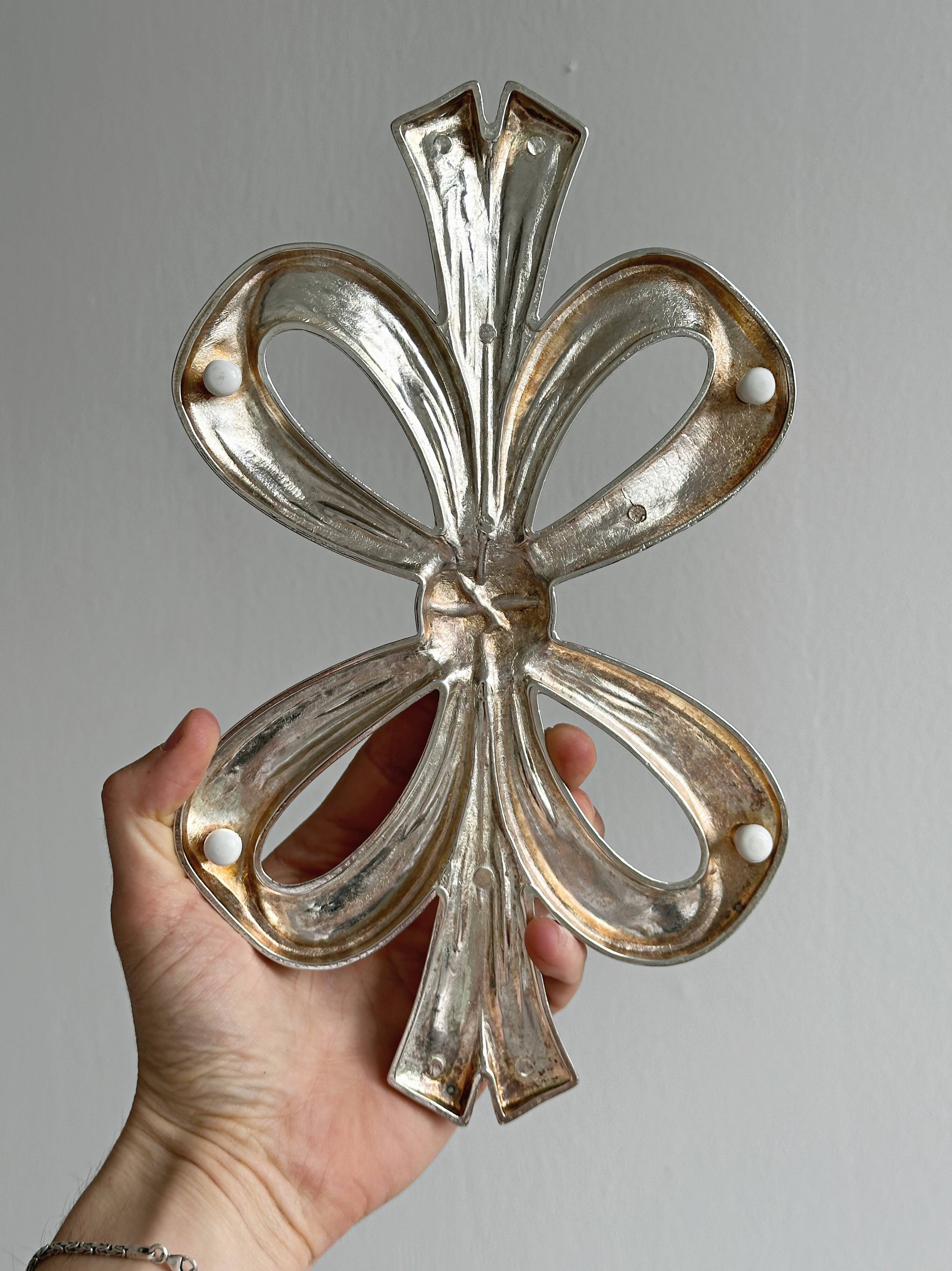 Dessous de plat en forme de nœud