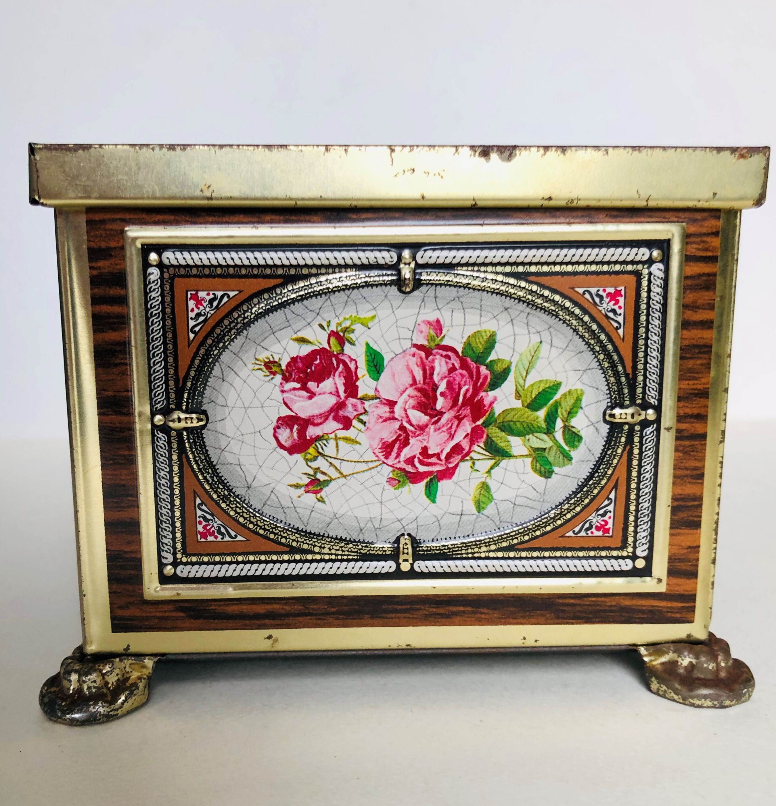Old metal box decorated with flowers