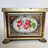 Old metal box decorated with flowers