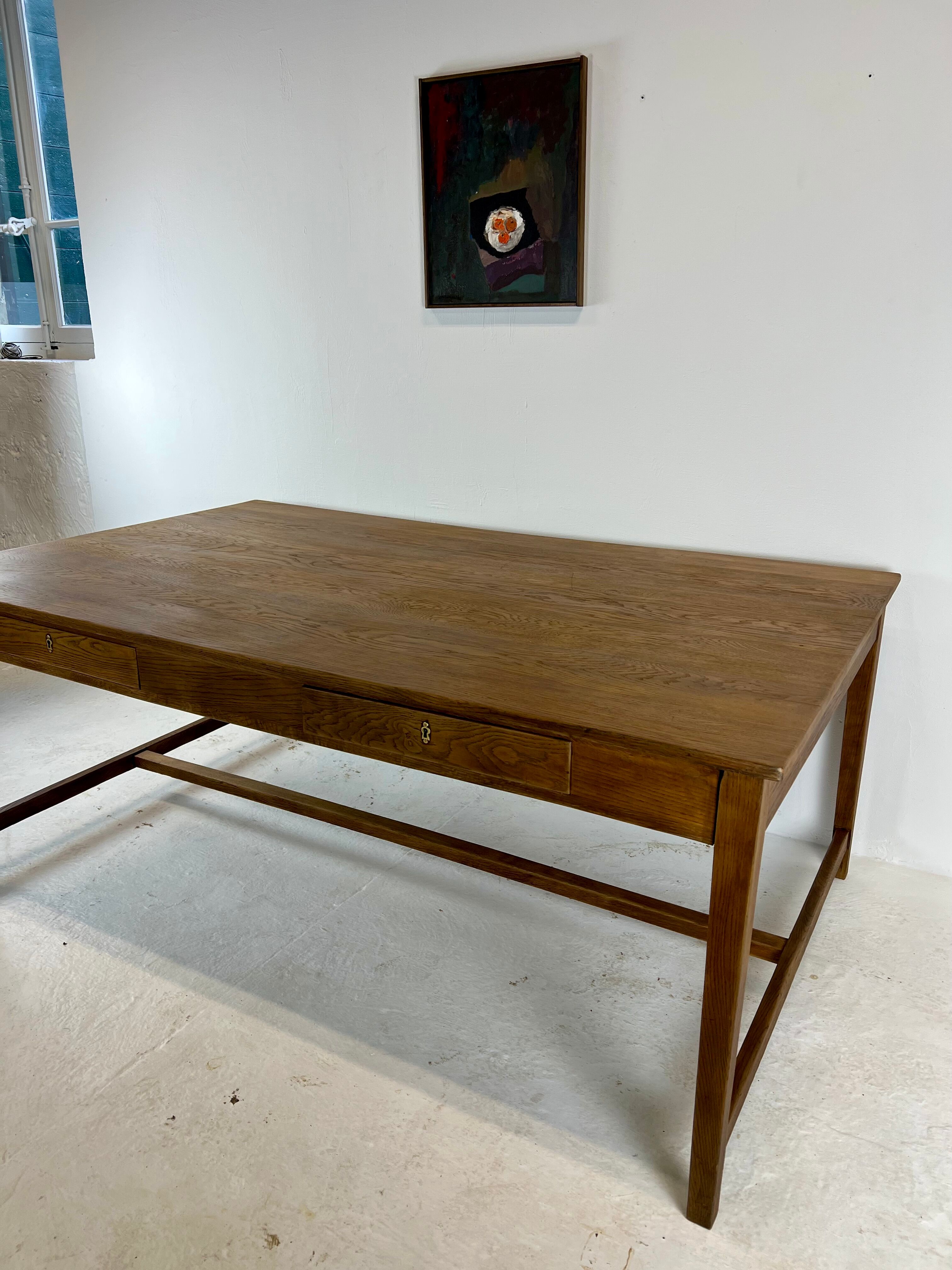 Two-sided oak work table, with 4 drawers
