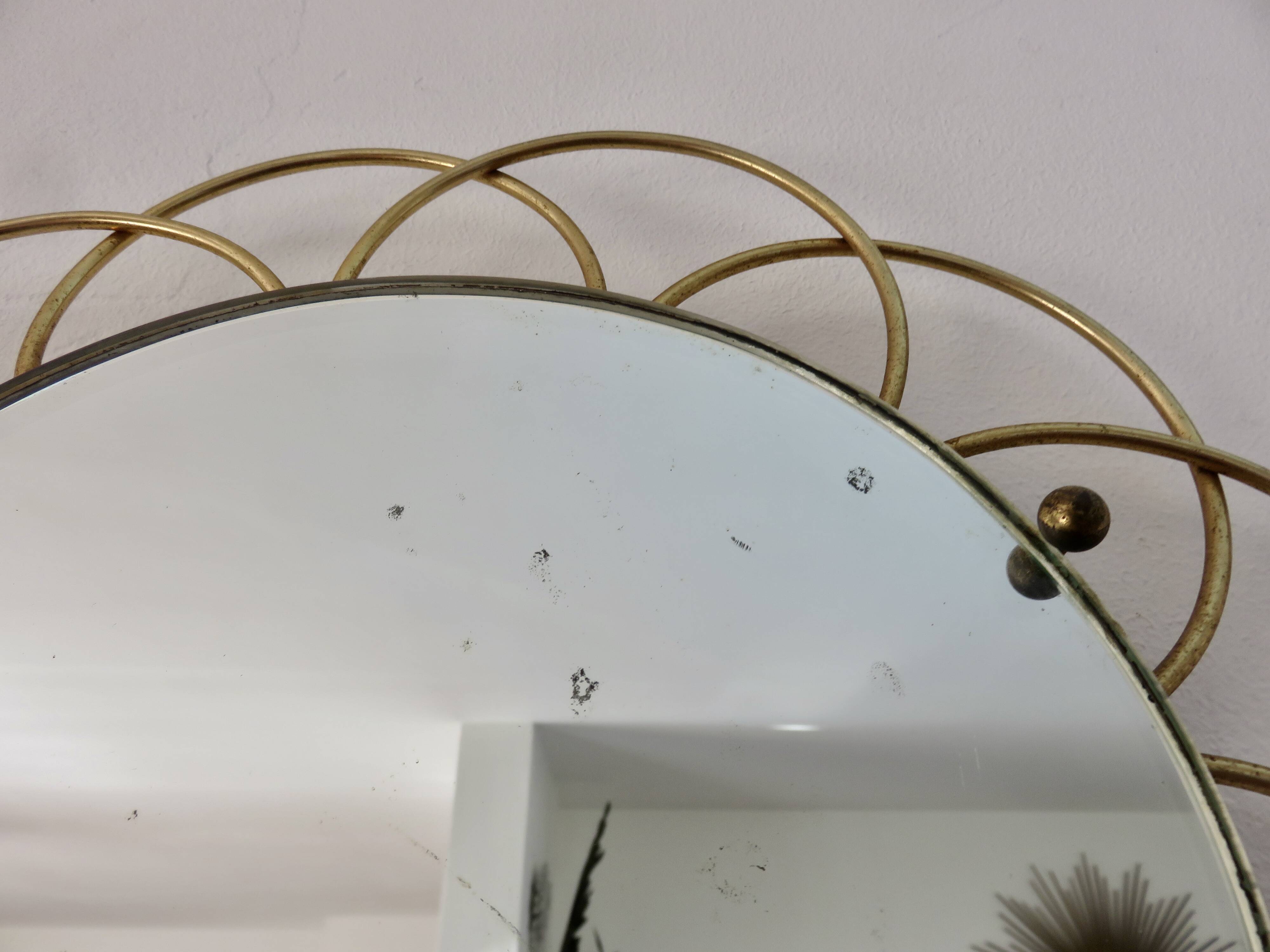 Miroir soleil " fleur " en métal doré années 60