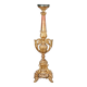 Eclectic antique candlestick in carved and gilded wood, 19th century.