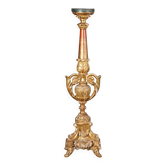 Eclectic antique candlestick in carved and gilded wood, 19th century.