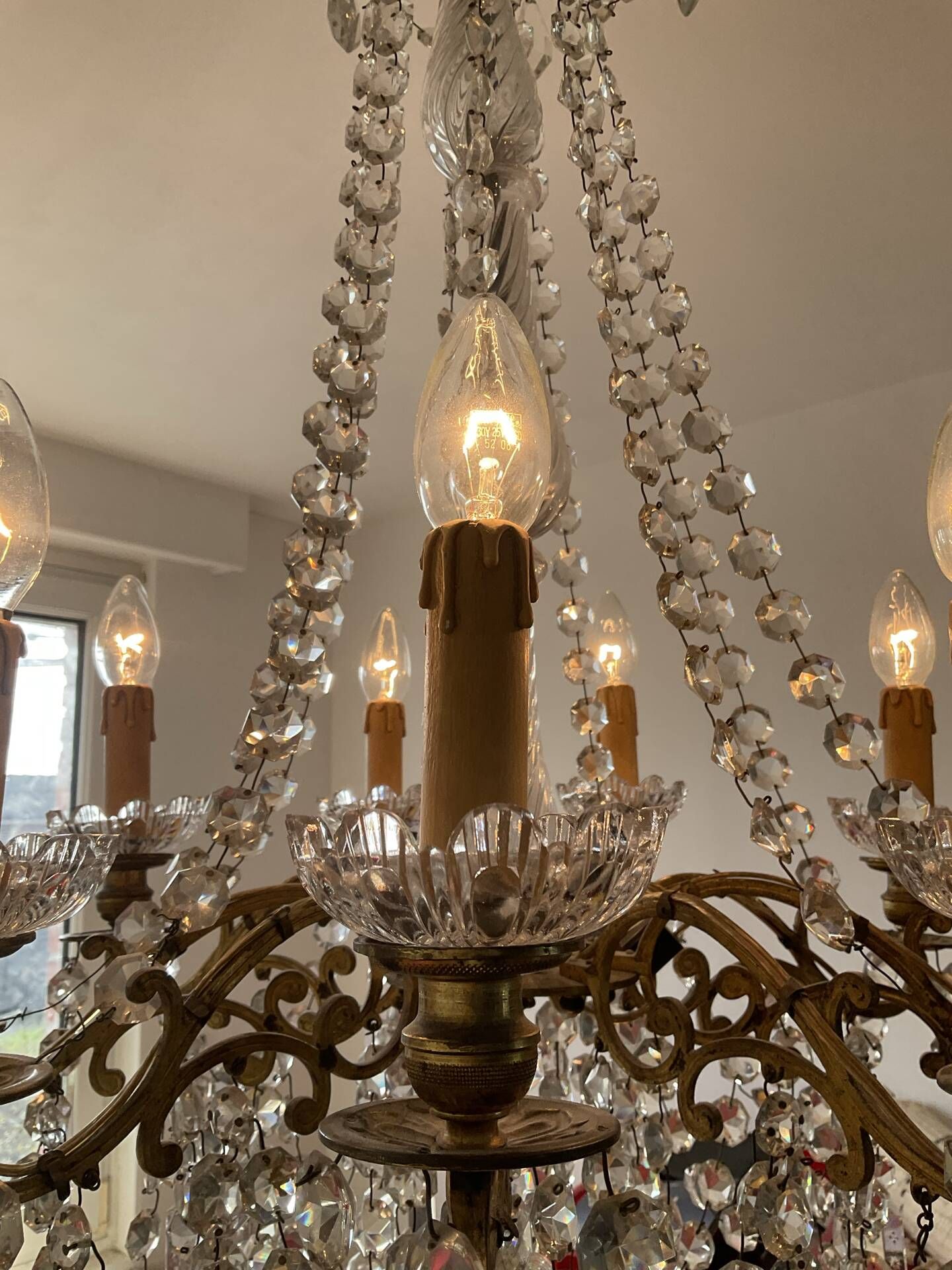 Grand chandelier in Louis XV style with crystal pendants.