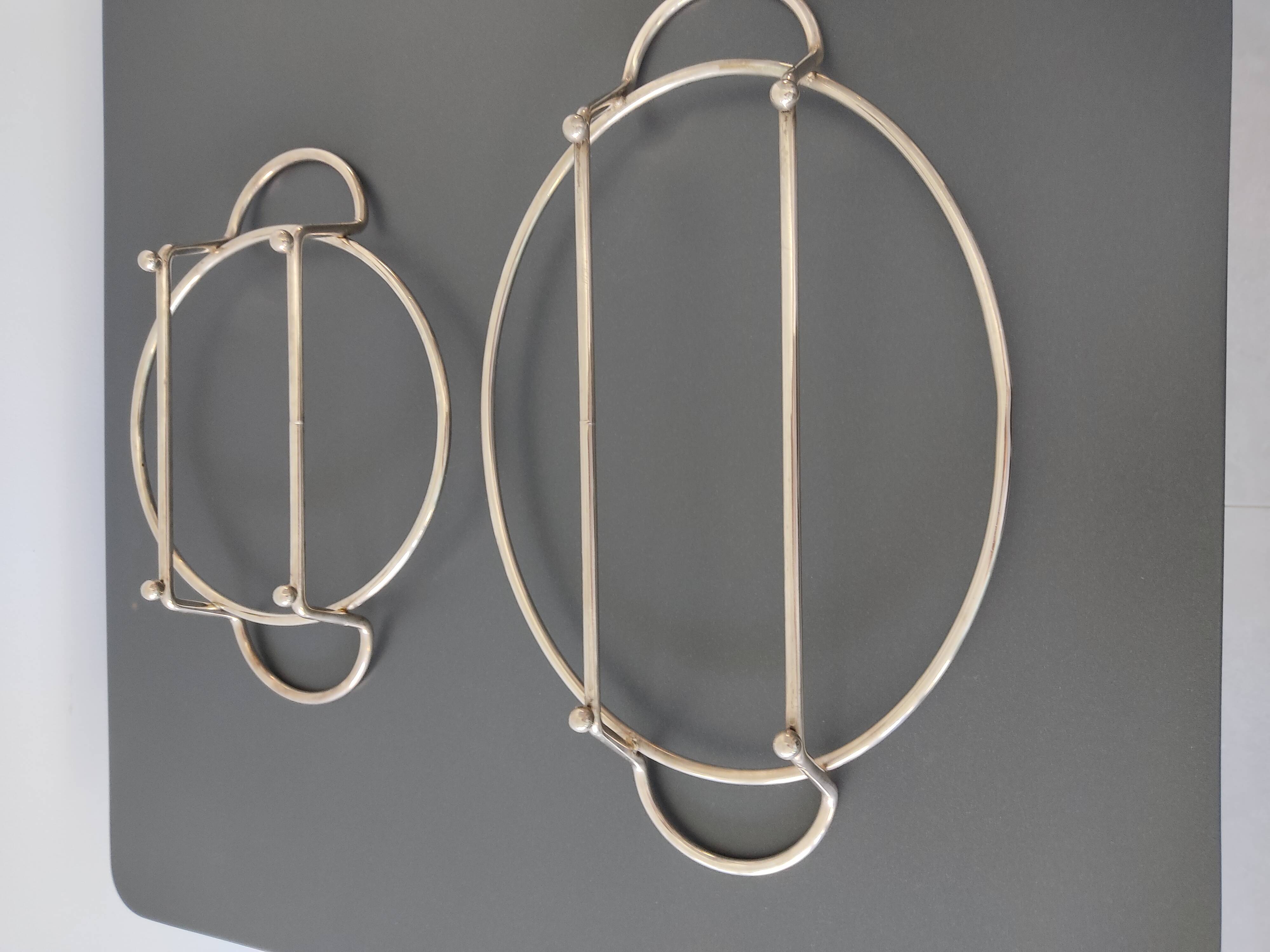 2 glass dishes with silvered steel frames from the 1960s, very good quality.