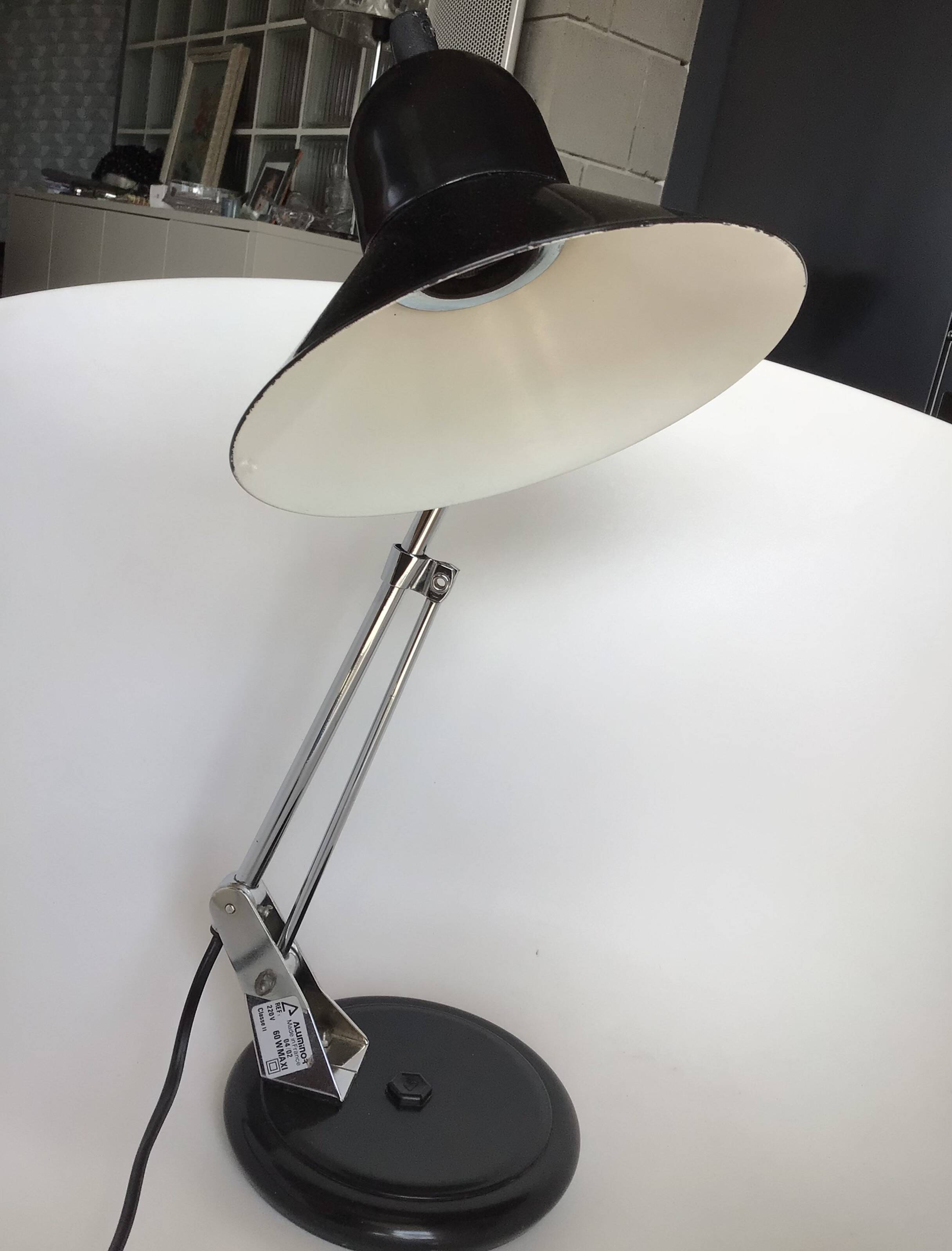 Adjustable black metal Aluminor desk lamp