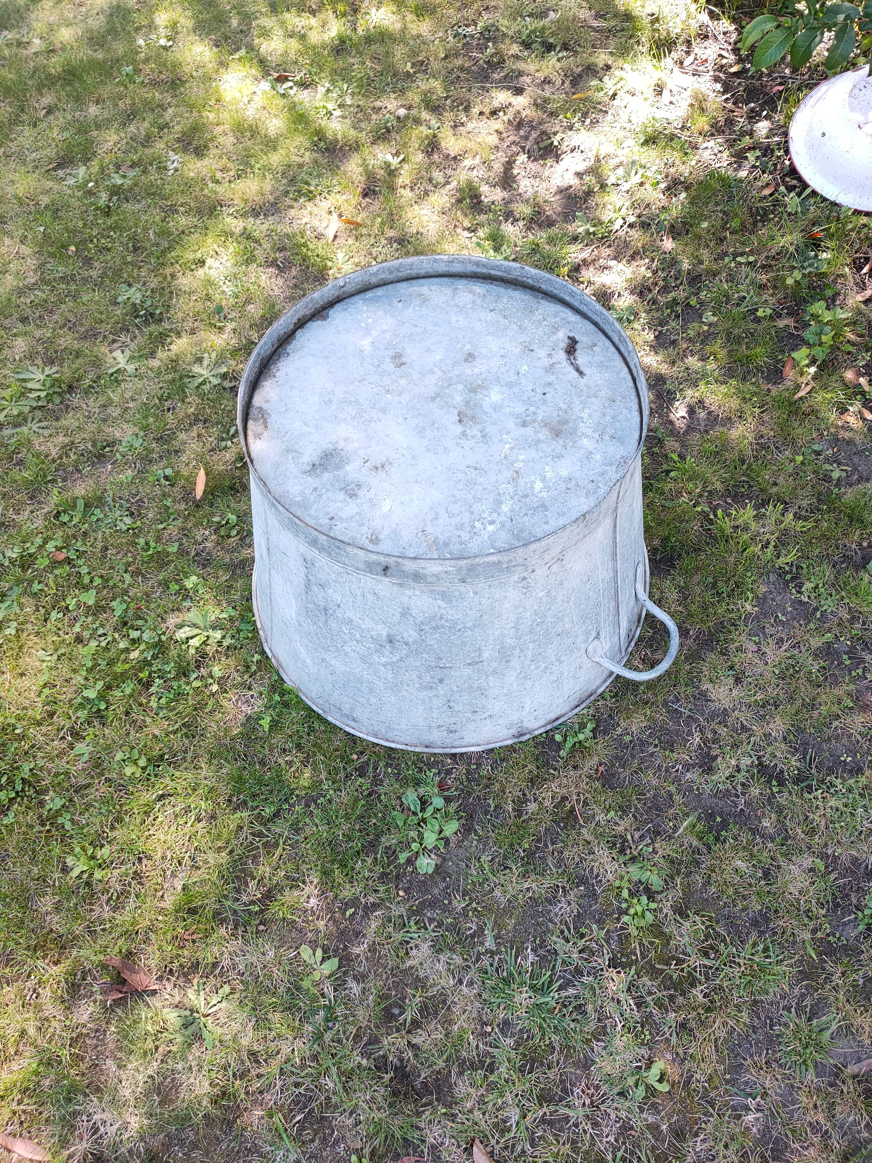 Old round zinc basin