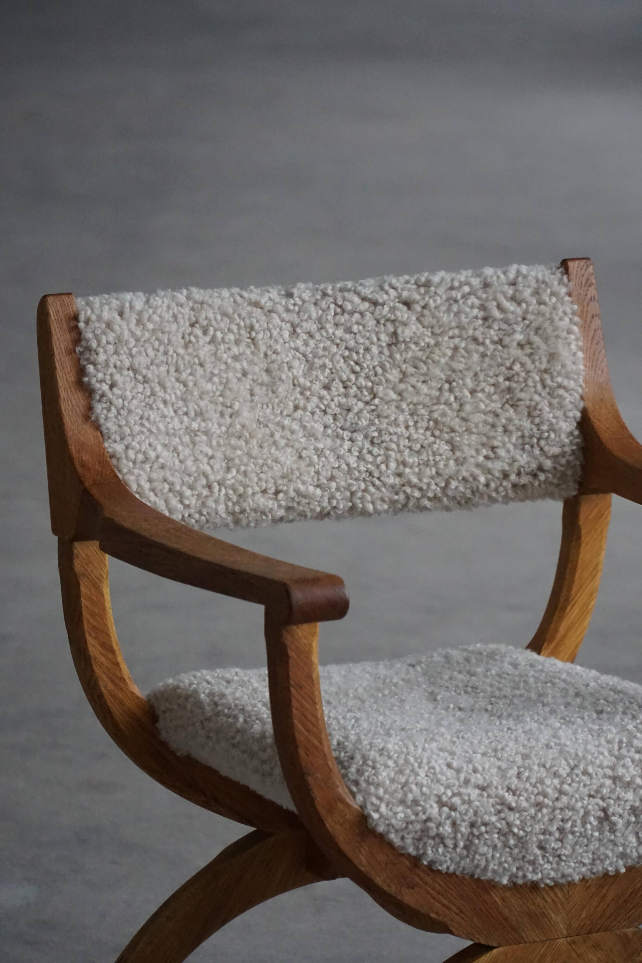 Henning Kjærnulf, Oak and lambswool armchair, "Kurul" model, Mid-century, 1960s