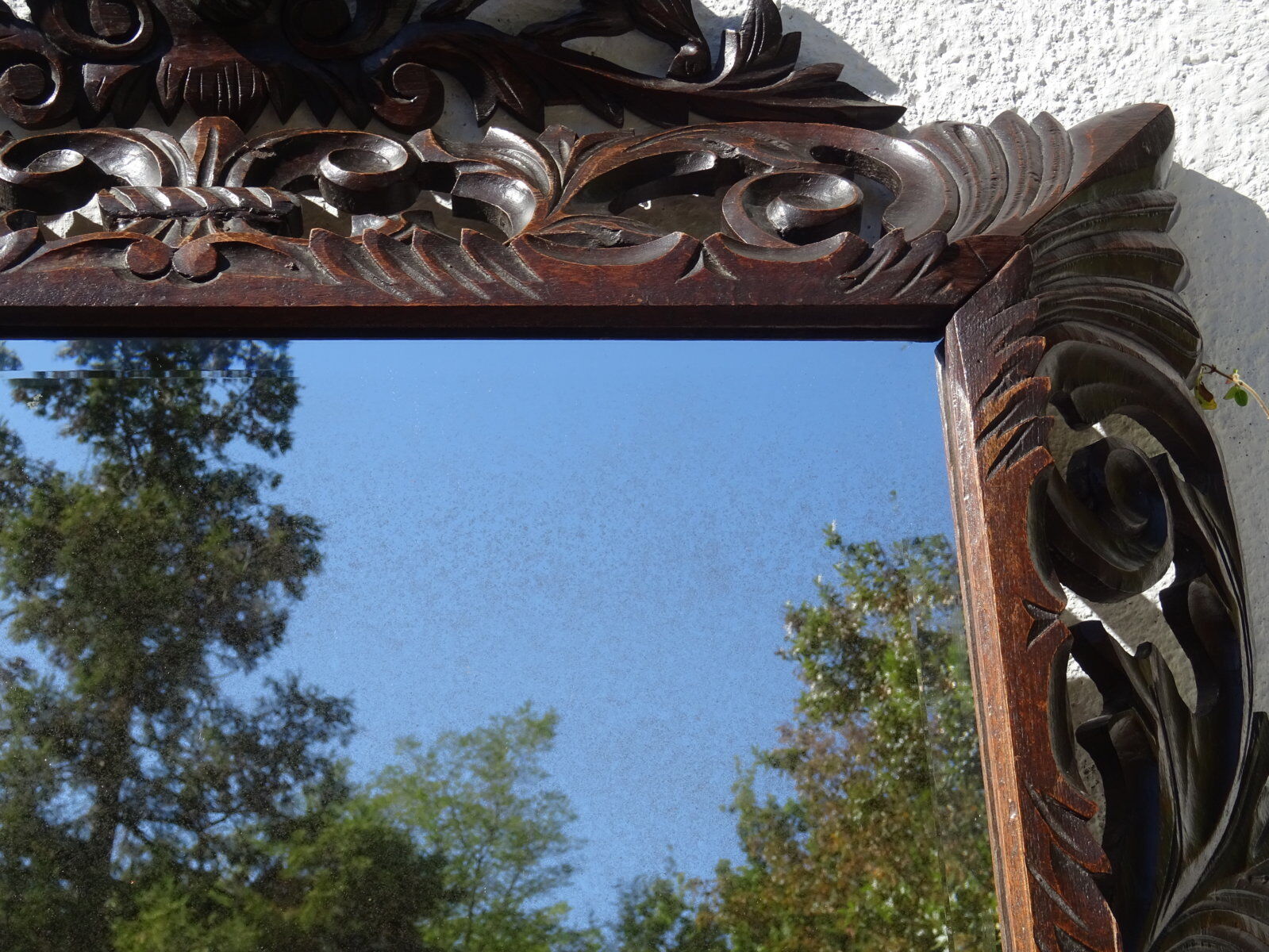 Miroir sculpté fronton lions