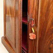 Large buffet in flame mahogany, William IV / Regency columns.