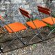 Framar orange felt folding chairs 1970