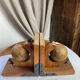 Pair of wooden bookends, rotating globes
