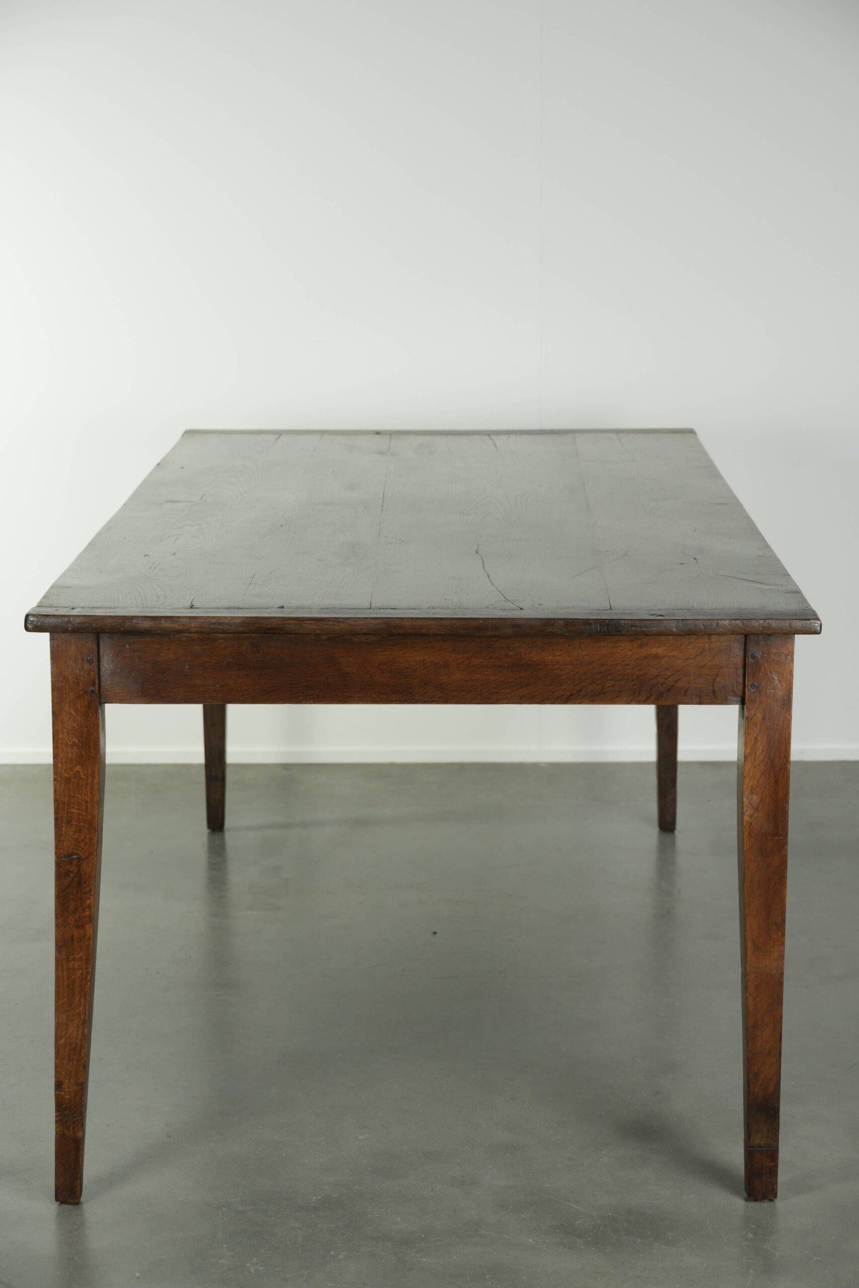 Antique French oak dining table from the early 19th century