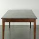 Antique French oak dining table from the early 19th century