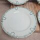 Set of 4 antique plates, Terre de fer Saint-Amand, green decoration.