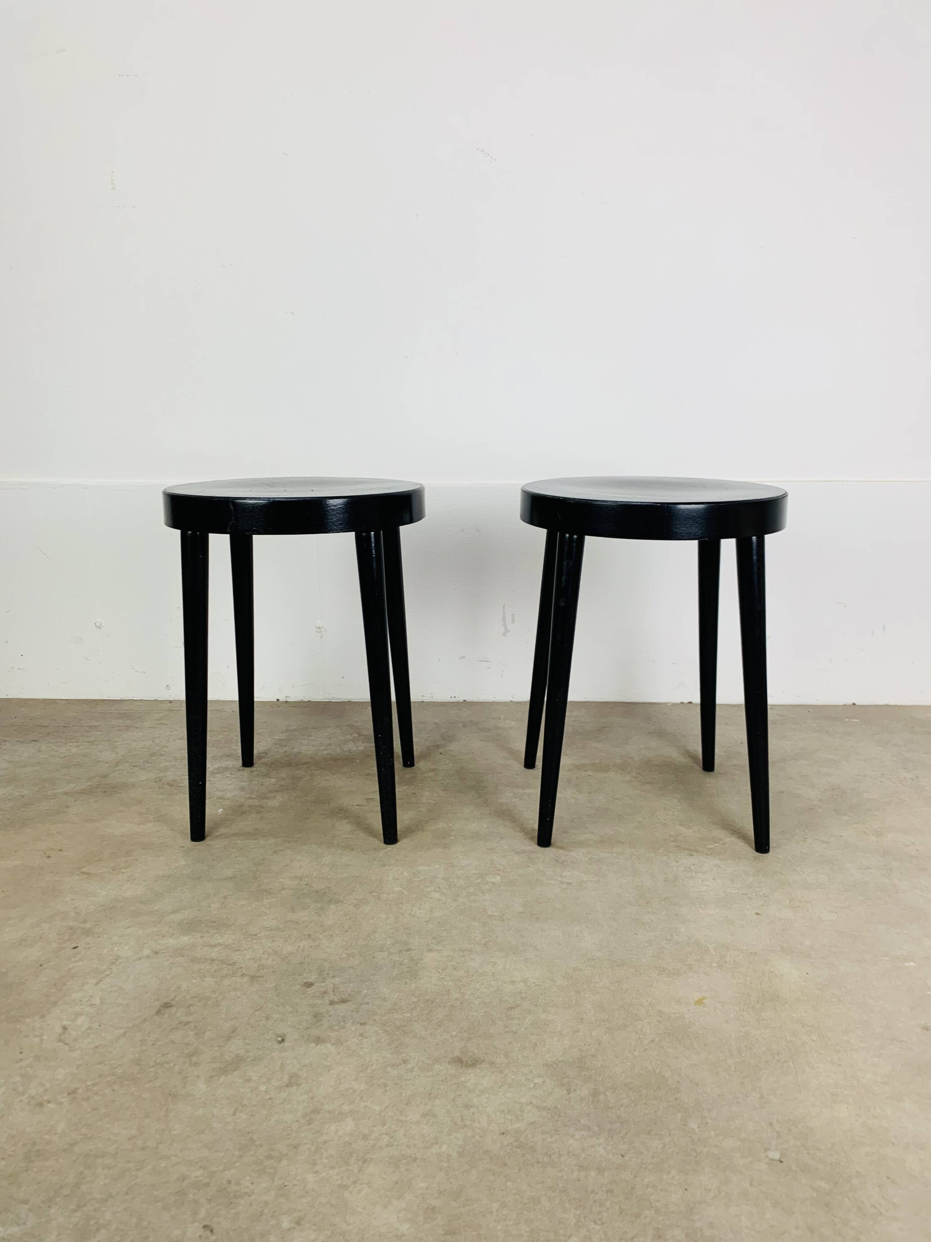 Pair of black Baumann stools, 1960s