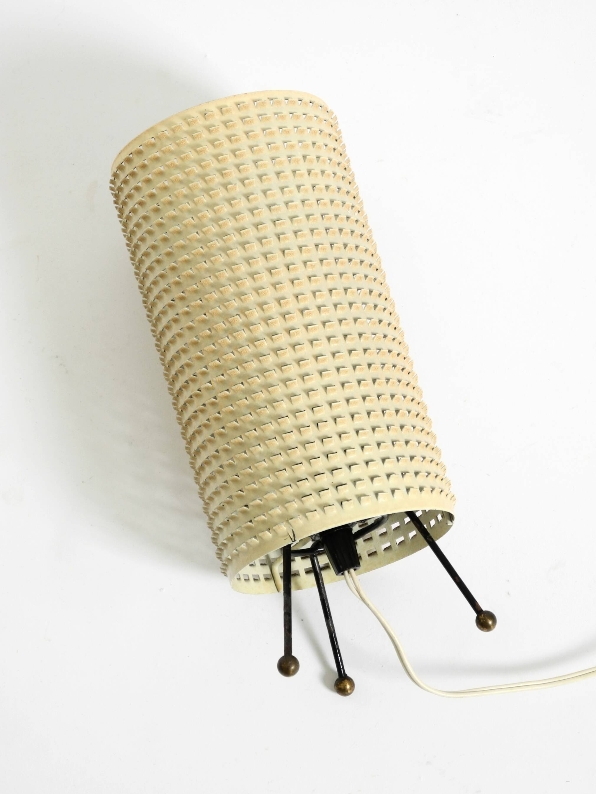Original 1950s brass tripod table lamp with a perforated metal lampshade