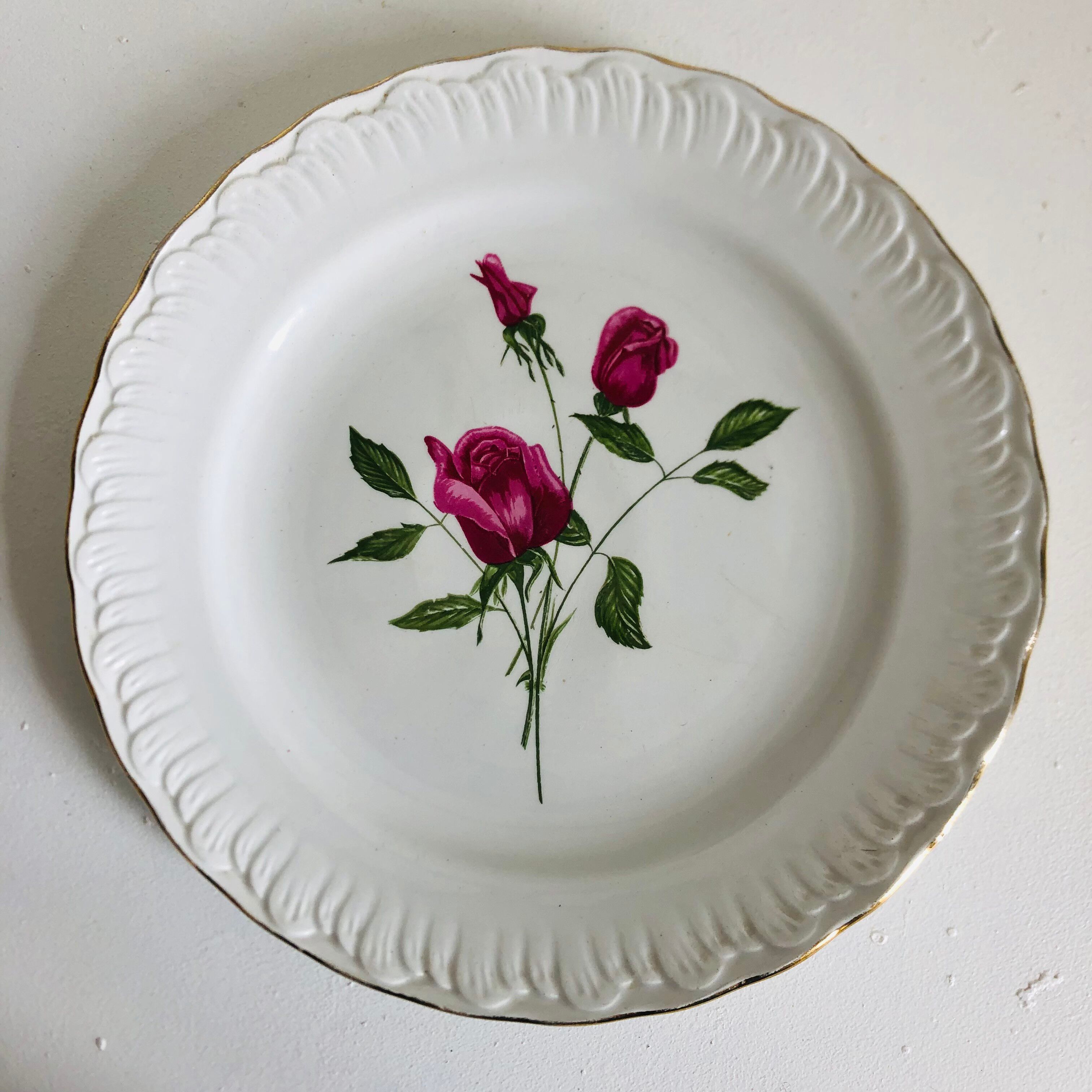 Plate by Amandinoise with a floral art deco rose motif.
