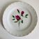 Plate by Amandinoise with a floral art deco rose motif.