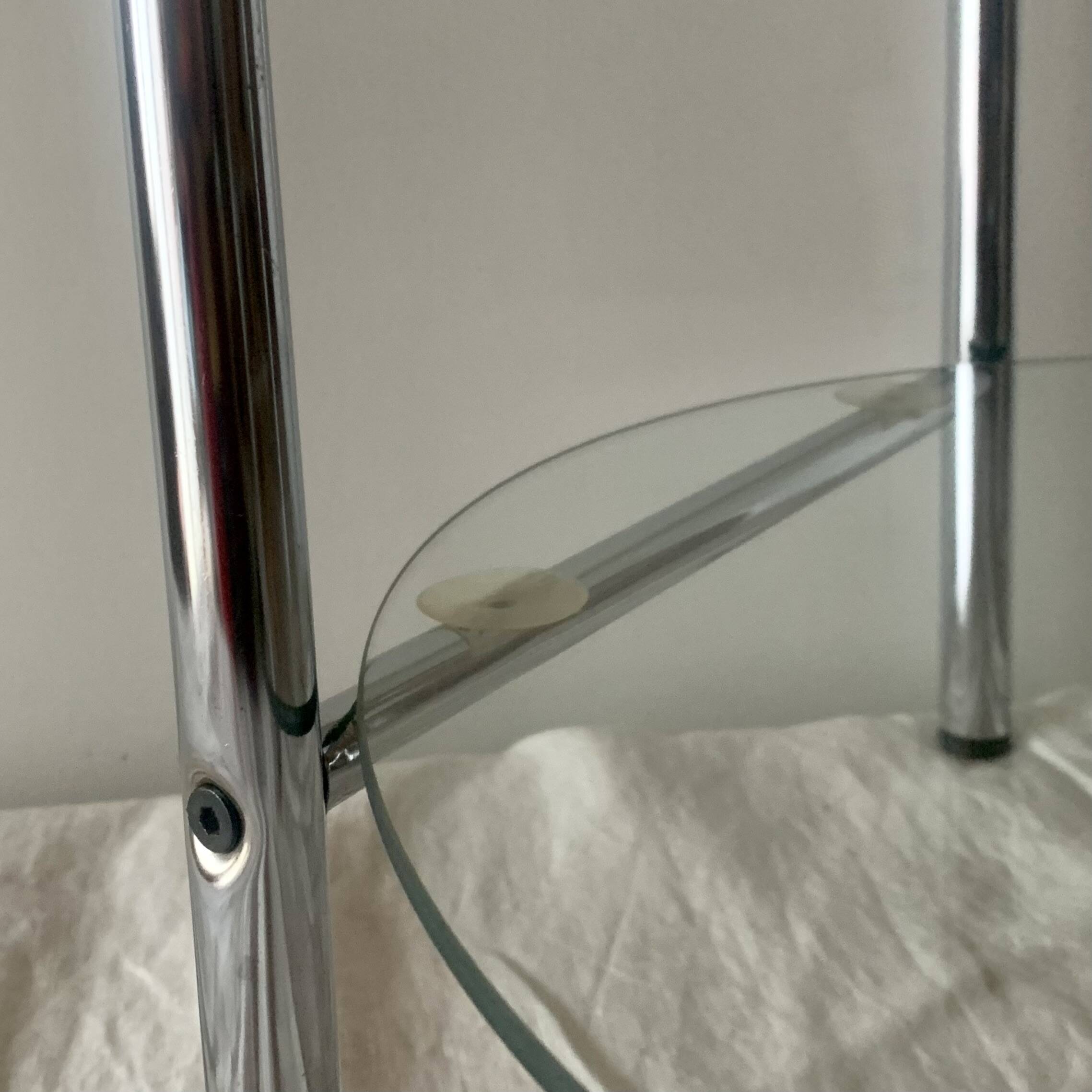 Pedestal table, vintage chrome steel saddle with 2 round windows