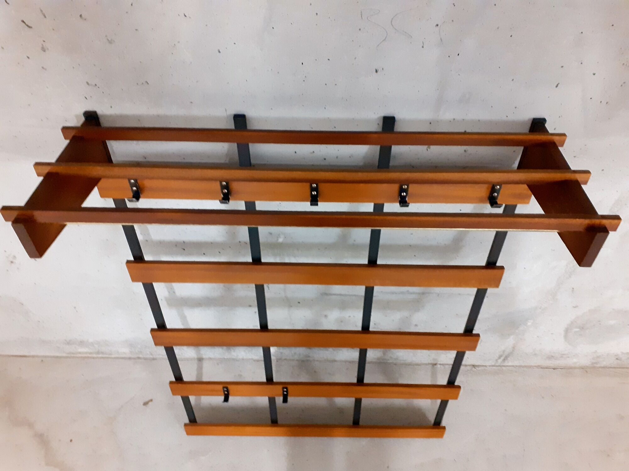 Wall coat rack in teak and vintage black metal