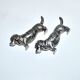 Set of 2 vintage animal knife rests, dachshund and basset hound, in silver-plated metal.