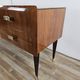 Mid-century drawer chest in mahogany, brass and glass.